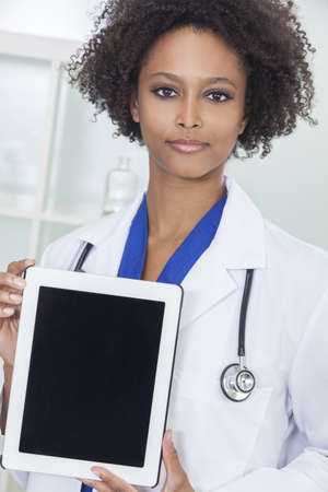 An African American female woman medical doctor with a tablet computer in hospital
の写真素材