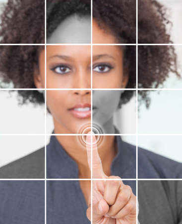 Photo grid montage of a successful african american businesswoman pressing a graphic symbol on a touchscreen. の写真素材