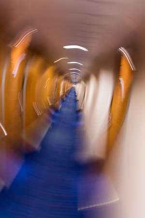 Concept photograph of motion blurred corridorの写真素材