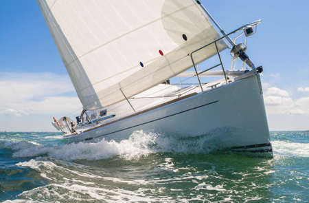 Close up of sailing boat, sail boat or yacht at seaの写真素材