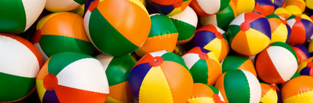 Panoramic web banner colorful beach balls