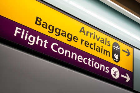 Arrivals Baggage Reclaim Flight Connections Sign at an Airport Terminalの写真素材