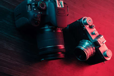 Granada, Spain, January 6, 2019: Old and new camera. Modern Canon EOS 700D and old camera Zenitのeditorial素材