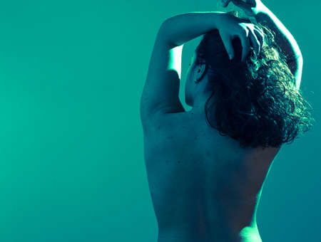 Emotional portrait, a girl in various emotional poses. Like under water. Studio shot. Copyspaceの写真素材