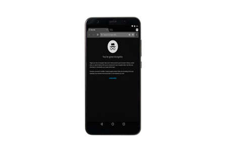 Granada, Spain; February 14, 2019: Google chrome incognito on mobile screen. Mock up mobile phone isolated on white background. Mockup top viewのeditorial素材