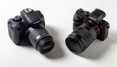 Granada, Spain, February 14, 2019: Cameras Canon and Sony. Concept of competition between camera brandsのeditorial素材