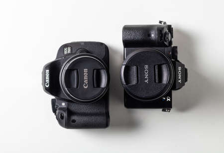 Granada, Spain, February 14, 2019: Cameras Canon and Sony. Concept of competition between camera brandsのeditorial素材