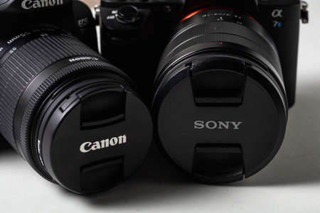 Granada, Spain, February 14, 2019: Cameras Canon and Sony. Concept of competition between camera brandsのeditorial素材