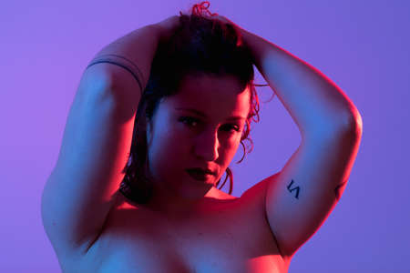 Emotional portrait, a girl in various emotional poses. Studio shot. Copyspaceの写真素材