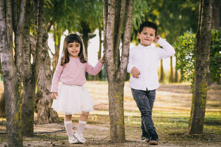 Girl and boy in the parkの写真素材