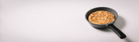 tortilla de patatas on white background, typical spanish dish