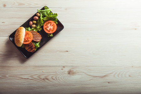 Cooking vegan food. Seitan is vegan meat for veggie burgerの写真素材