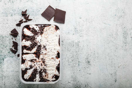 Ice cream with chocolate and cream sandwich cookies. Ice cream dessert on concrete background.の写真素材