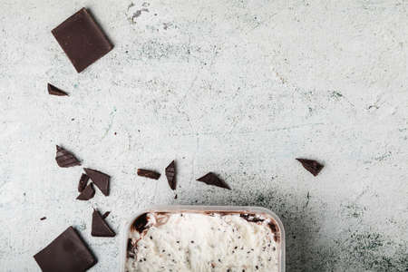 Ice cream with chocolate and cream sandwich cookies. Ice cream dessert on concrete background.の写真素材
