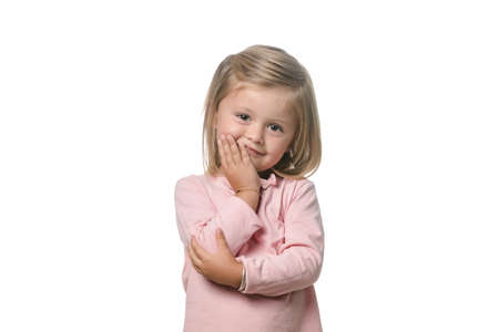 Adorable blonde little girl on white backgroundの写真素材