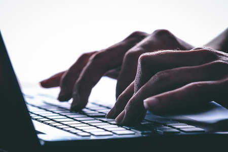 Hands typing on the computer keyboard. Modern styleの写真素材