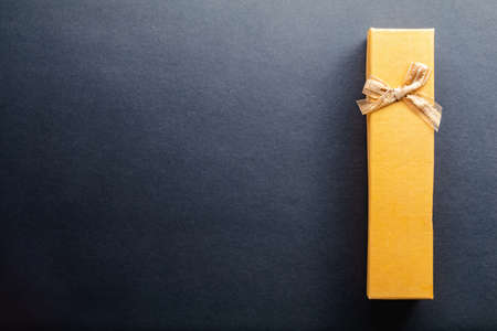 Gift on black table and copy spaceの写真素材