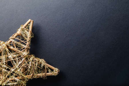christmas star on black background and copy spaceの写真素材