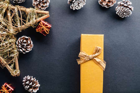 Christmas decoration and gift on black backgroundの写真素材
