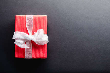 Gift on black table and copy spaceの写真素材