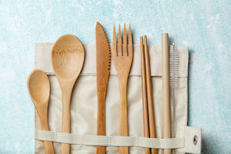 Eco friendly bamboo cutlery set on blue background. Zero waste conceptの写真素材
