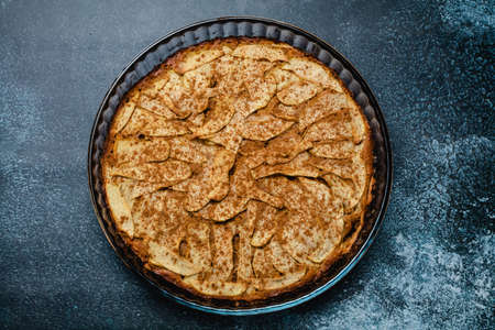 Sweet homemade apple cake with cinnamon. Top viewの写真素材