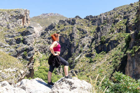 Strong and free girl at the mountain in Sierra Nevadaの写真素材