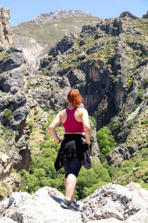 Strong and free girl at the mountain in Sierra Nevadaの写真素材