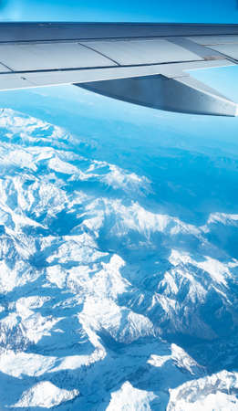 views of the plane's wing and the Alps, Europeの写真素材