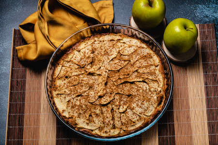 Sweet homemade apple cake with cinnamon. Top viewの写真素材