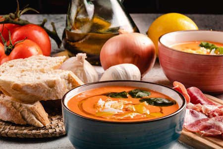 Salmorejo Soup With Ham And Eggs In A Bowlの写真素材