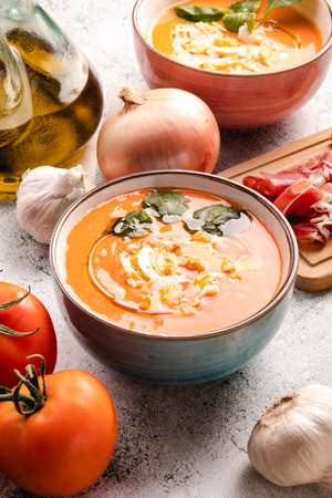 Salmorejo Soup With Ham And Eggs In A Bowlの写真素材