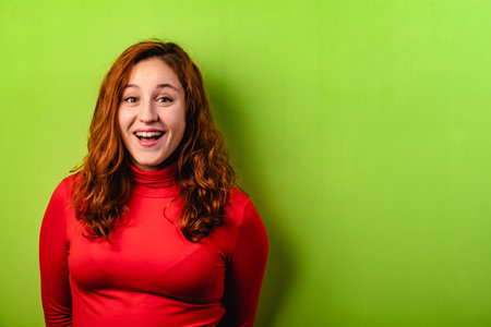 funny surprised girl showing empty copy space