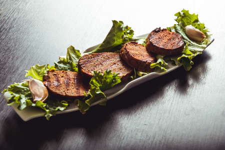 Real food, vegan meat in a restaurantの写真素材