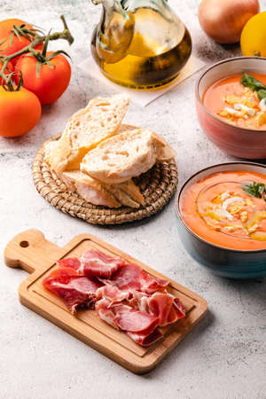Salmorejo Soup With Ham And Eggs In A Bowlの写真素材