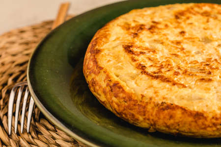 Spanish omelette with potatoes and onion, typical Spanish cuisine.の写真素材