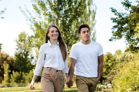 Couple walking in the public parkの写真素材