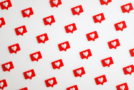 Many 3d social media notifications Love like heart icon in red rounded square pin pattern. 3d renderの写真素材