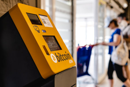 ATM machine for payment by Bitcoin cryptocurrencyのeditorial素材