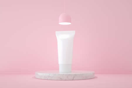 3D illustration of white blank tube of cosmetic product placed on marble plate against pink backgroundの写真素材