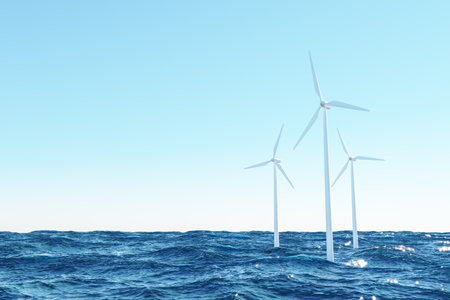 Wind turbines in waving seaの写真素材