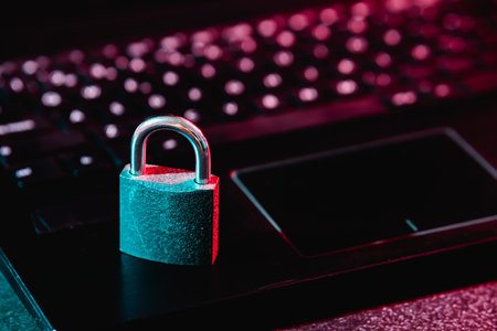 Small padlock on netbook keyboardの写真素材