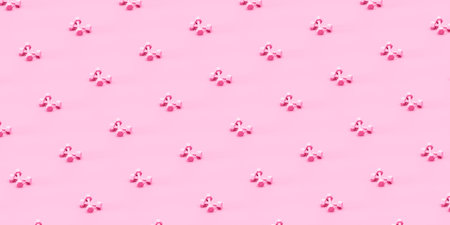 Seamless background of pink dumbbellsの写真素材