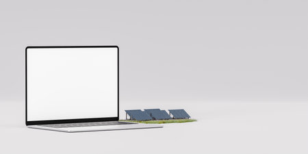 Modern laptop mock up near solar panelsの写真素材