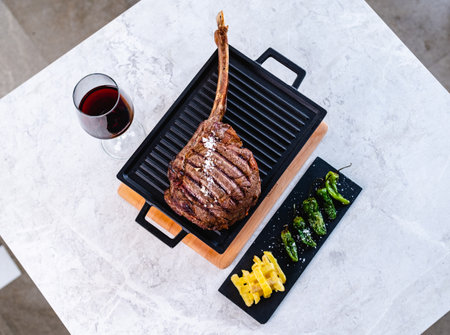 Grilled meat served with wine in barの写真素材