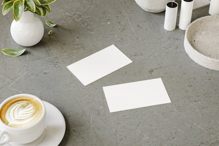 Photo of two business cards on office desk. Template for branding. 3d renderの写真素材