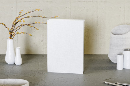 3D rendering of white book on tableの写真素材