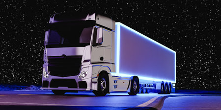 Modern large truck driving on road under starry skyの写真素材
