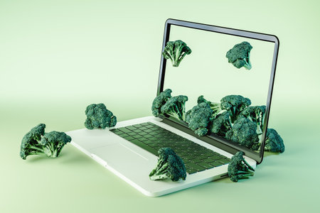 3d rendering of open laptop with broccoli in modern studioの写真素材