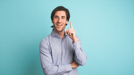 Thoughtful man with great idea in blue studio